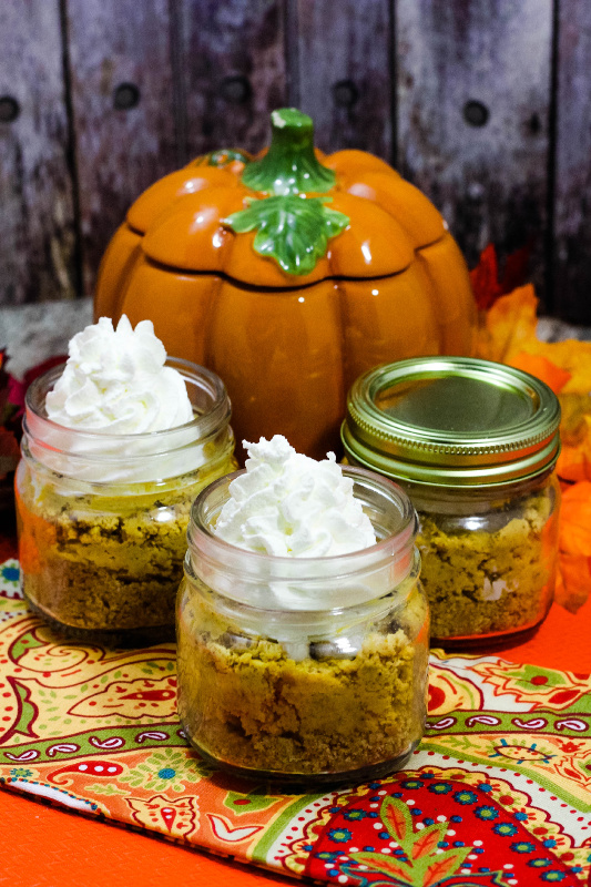 pumpkin on table with No Bake Pumpkin CheeseCake