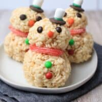 Snowman Rice Krispy Treats on a white plate