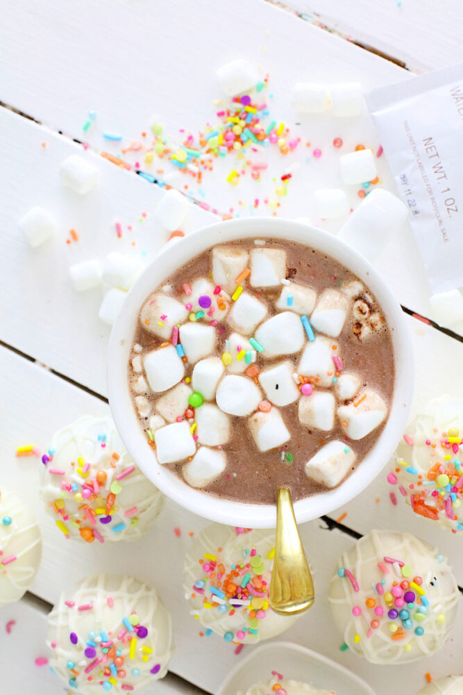 hot cocoa in a mug on a yellow napkin