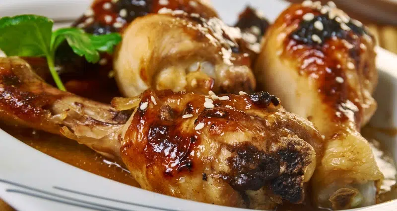 Brown Sugar Candy Chicken sitting on a plate