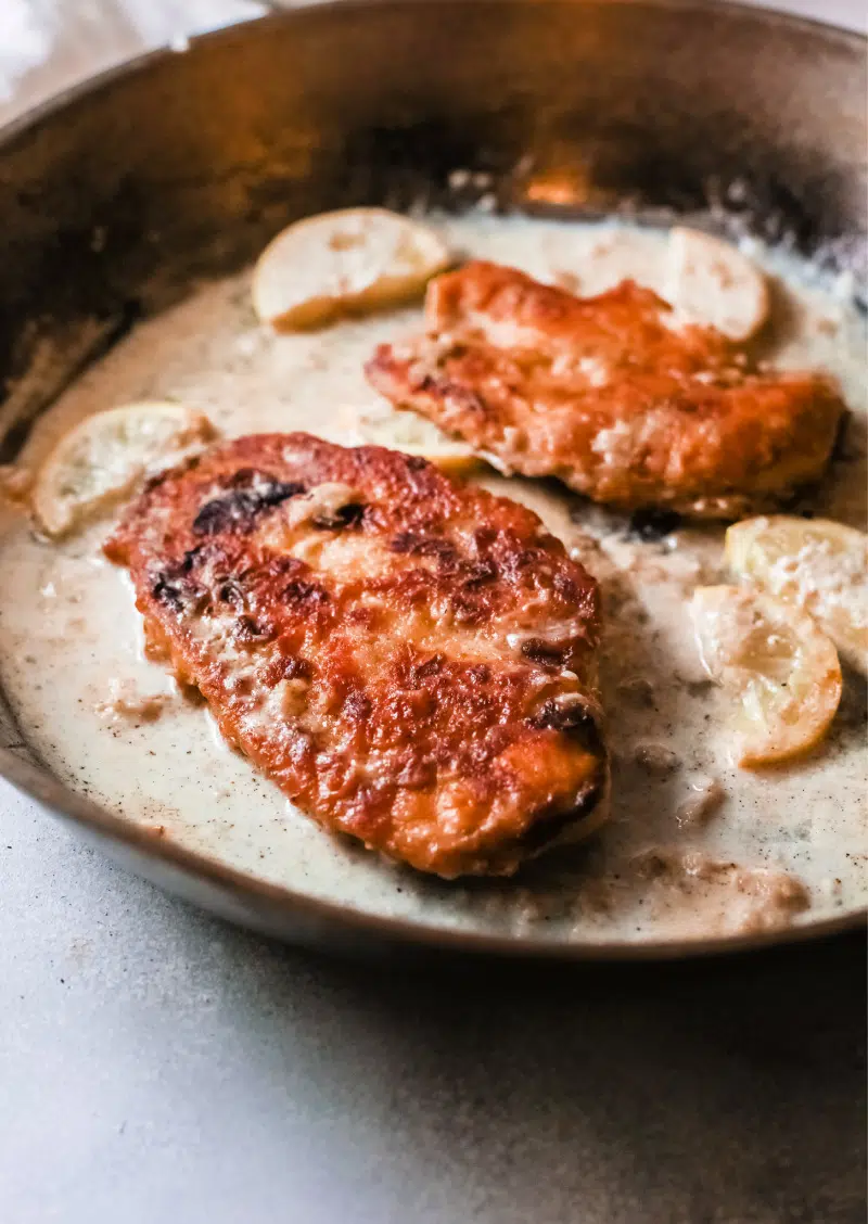 Chicken in a pan with cream