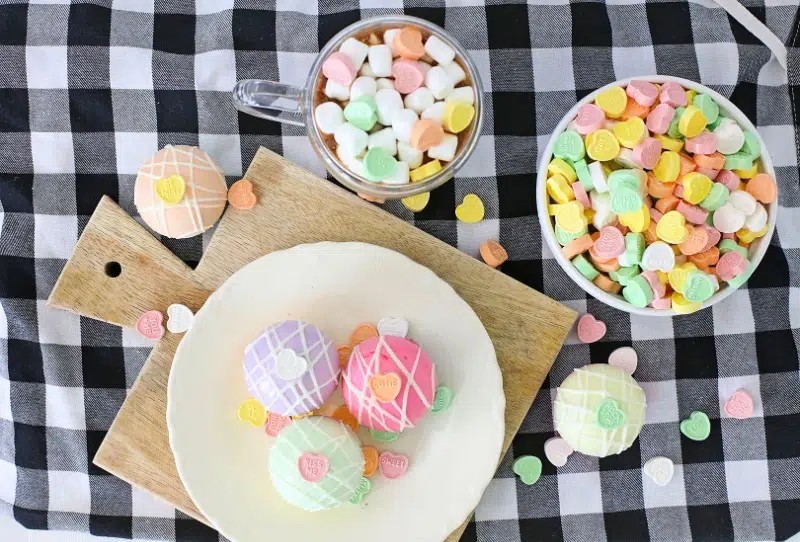 hot cocoa bombs on a board