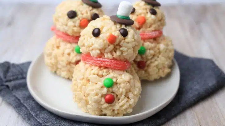 Snowman Rice Krispy Treats on a white plate