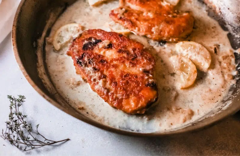 Chicken Francese in a pan on a table