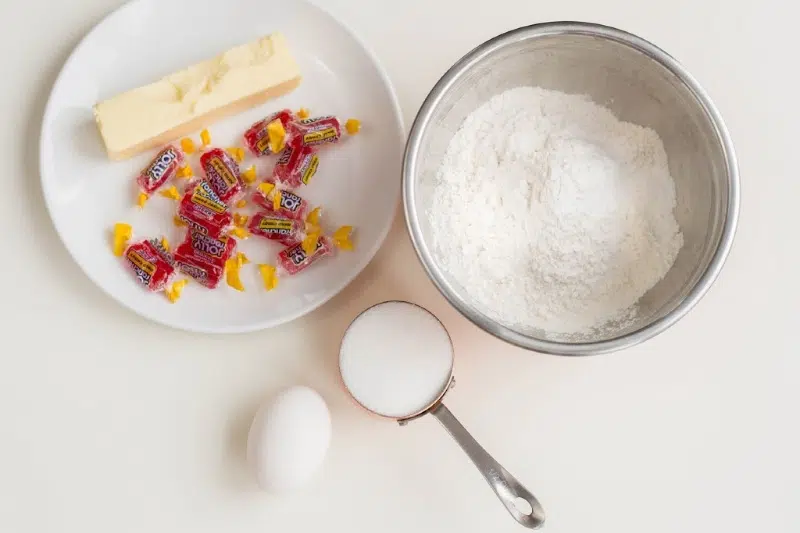 flour, eggs and candy on plates